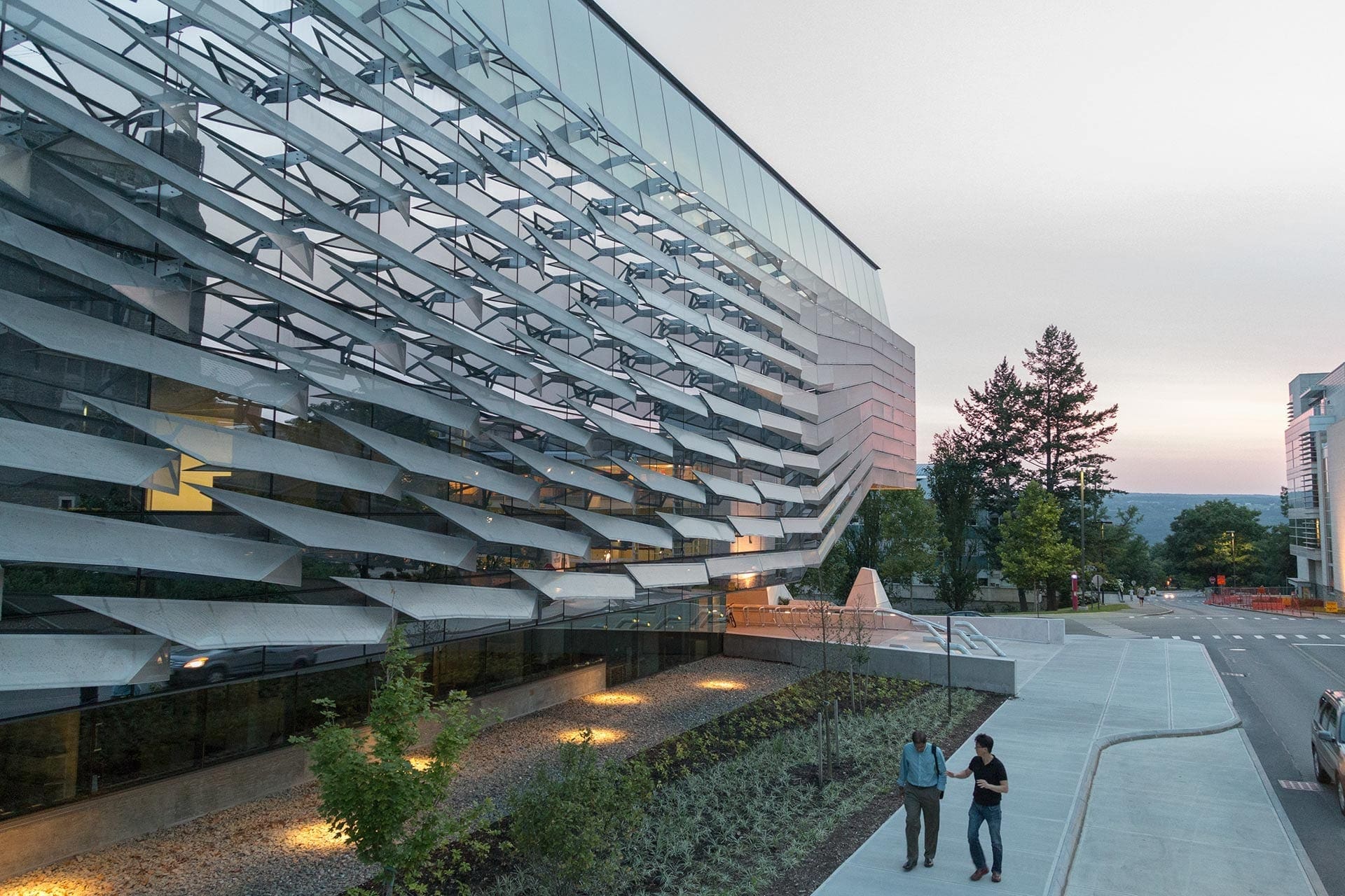 Photograph of Gates Hall at dusk.