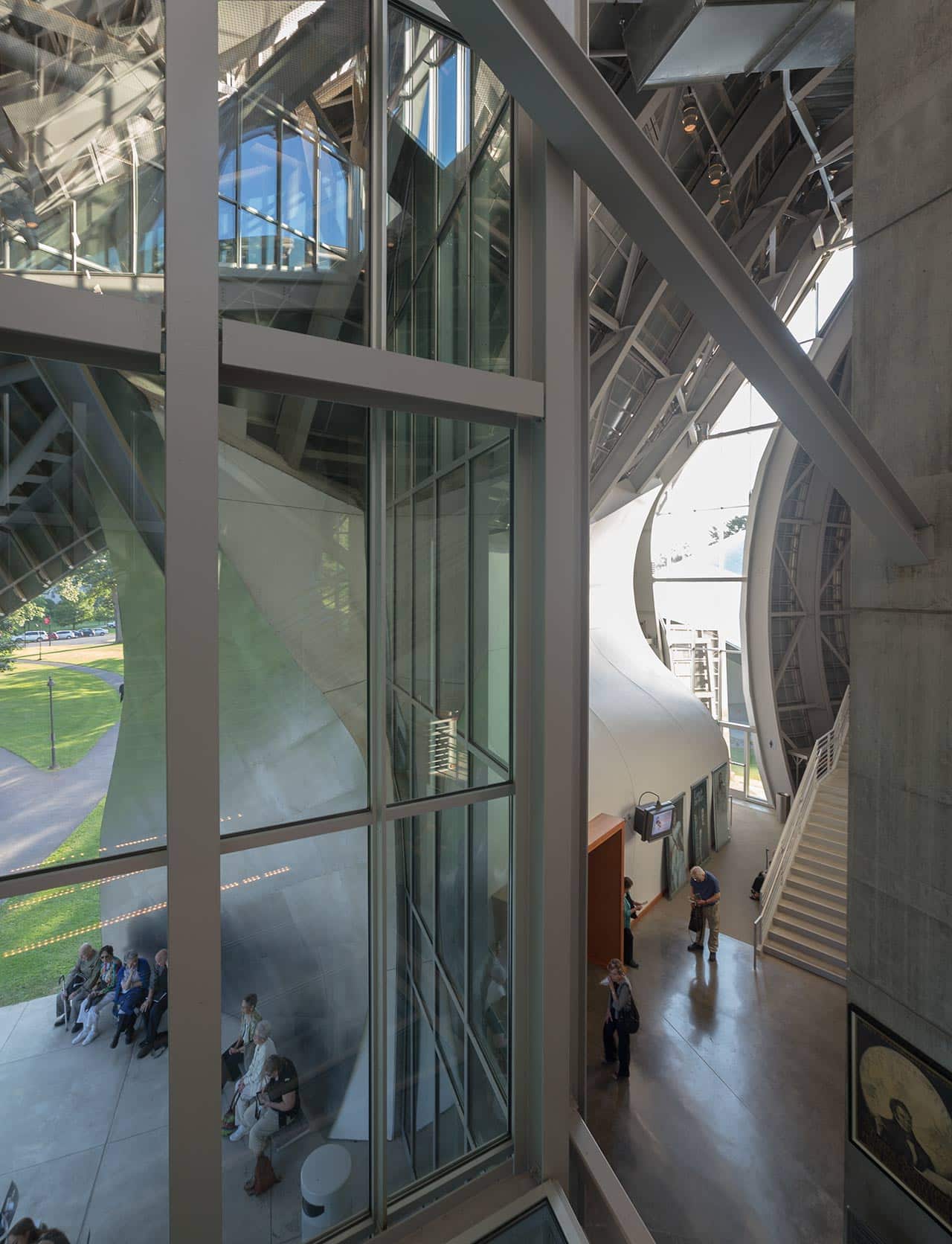 Interior and exterior of Fisher Center, viewed through the massive glazing system on the front entrance.