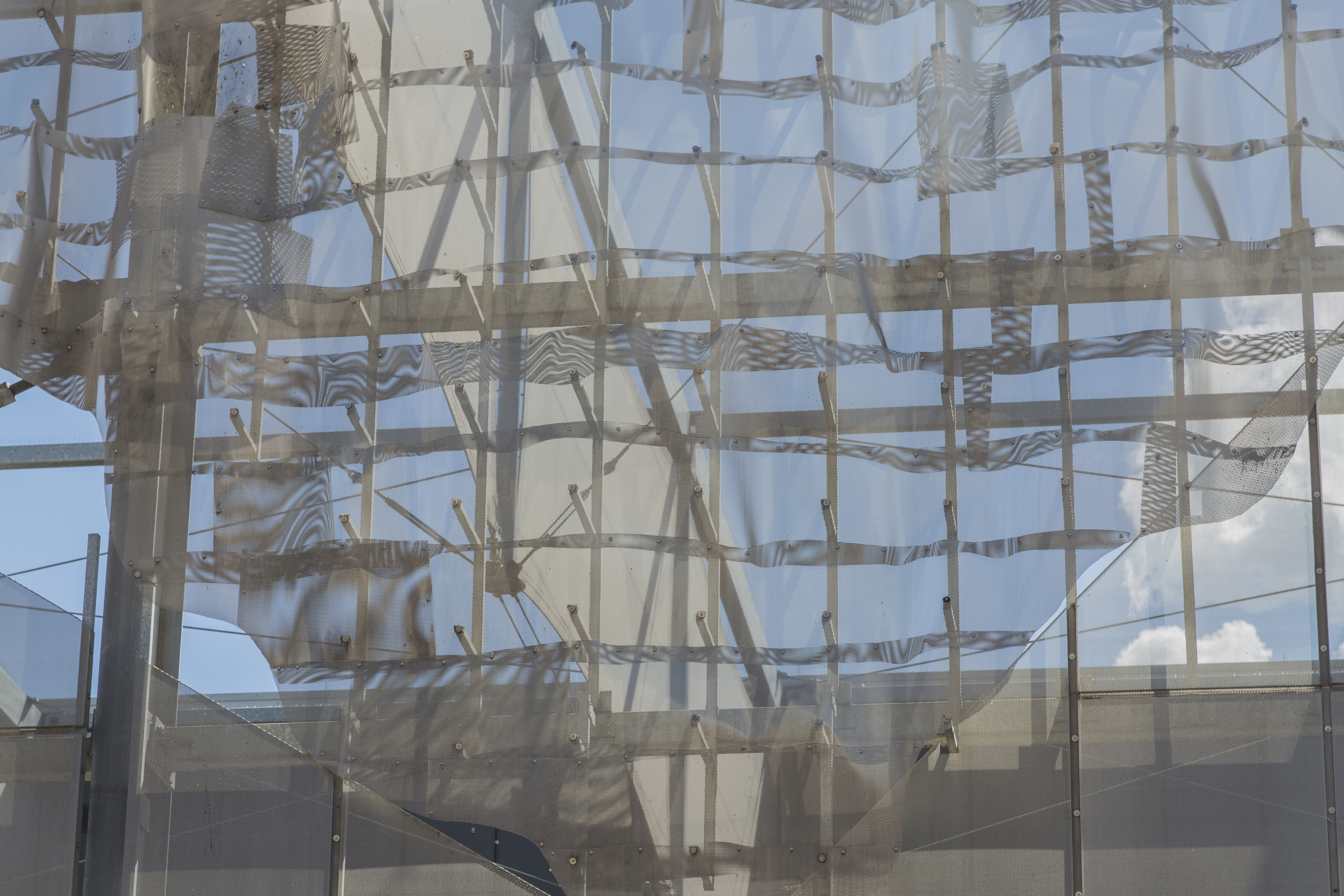 Moire patterns on the expanded aluminum facade and artwork at Bartle Hall