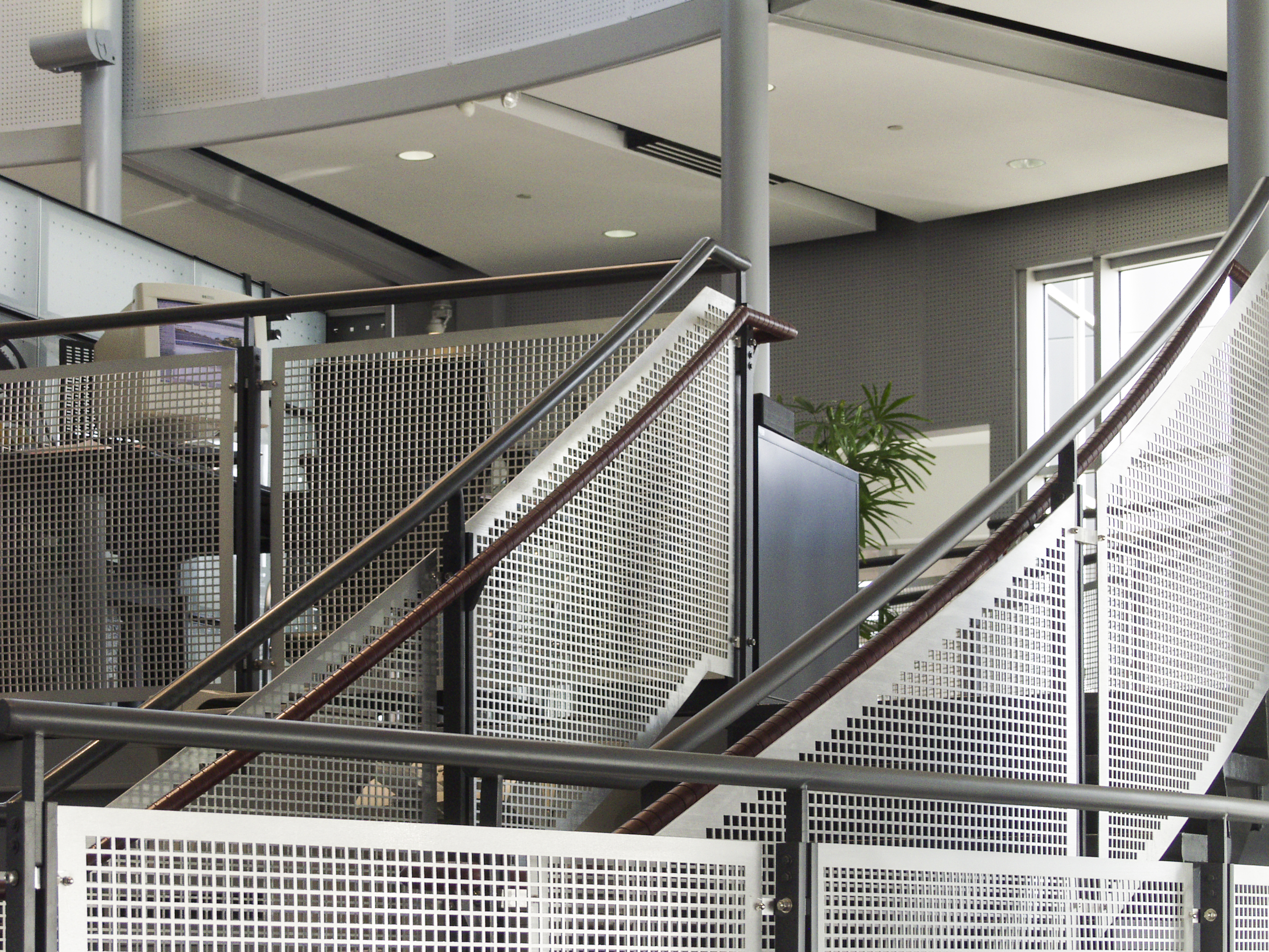 Detail of the handrail screens in square perf