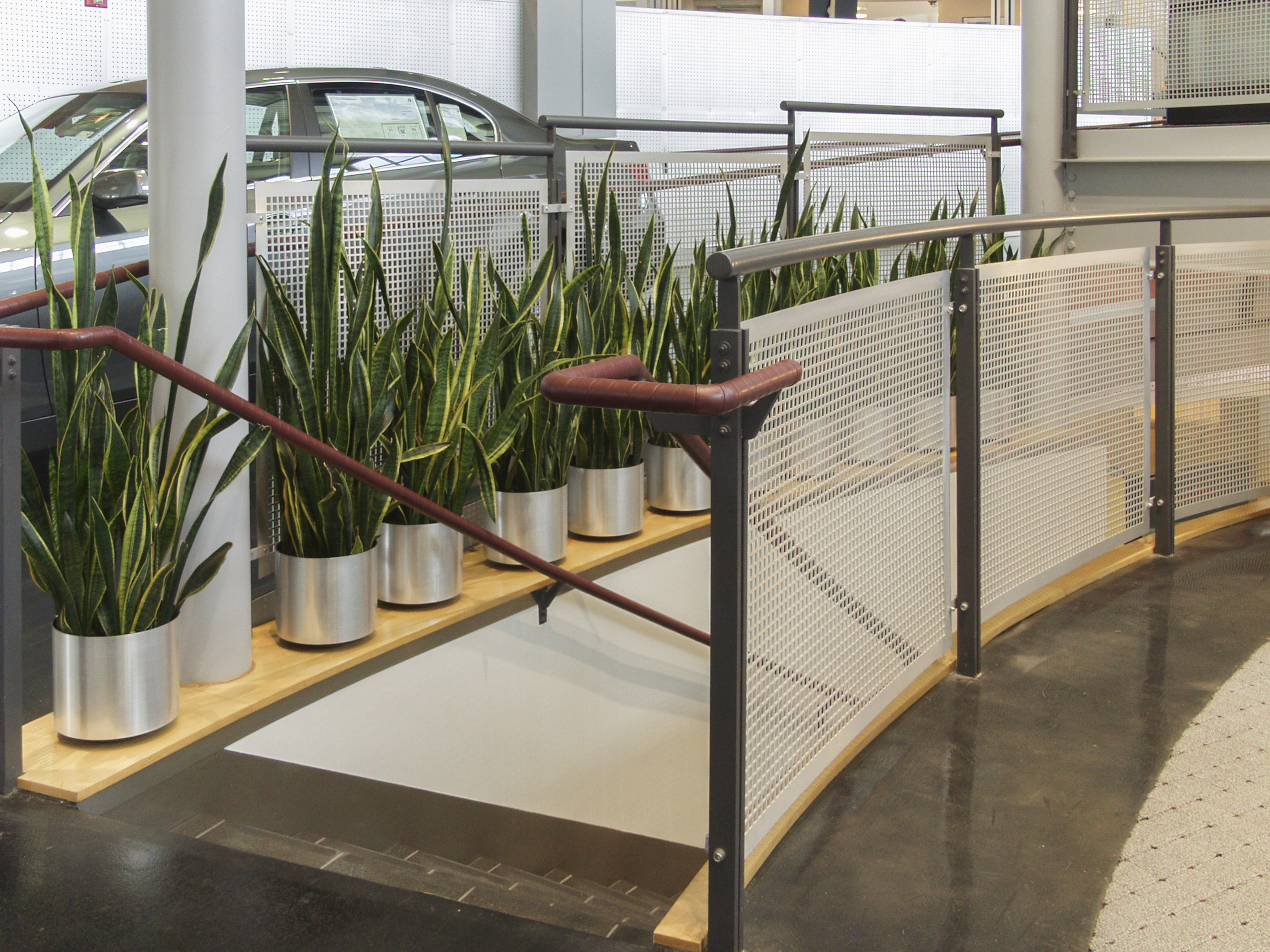 Detail of the aluminum metalwork at the Baron BMW Showroom