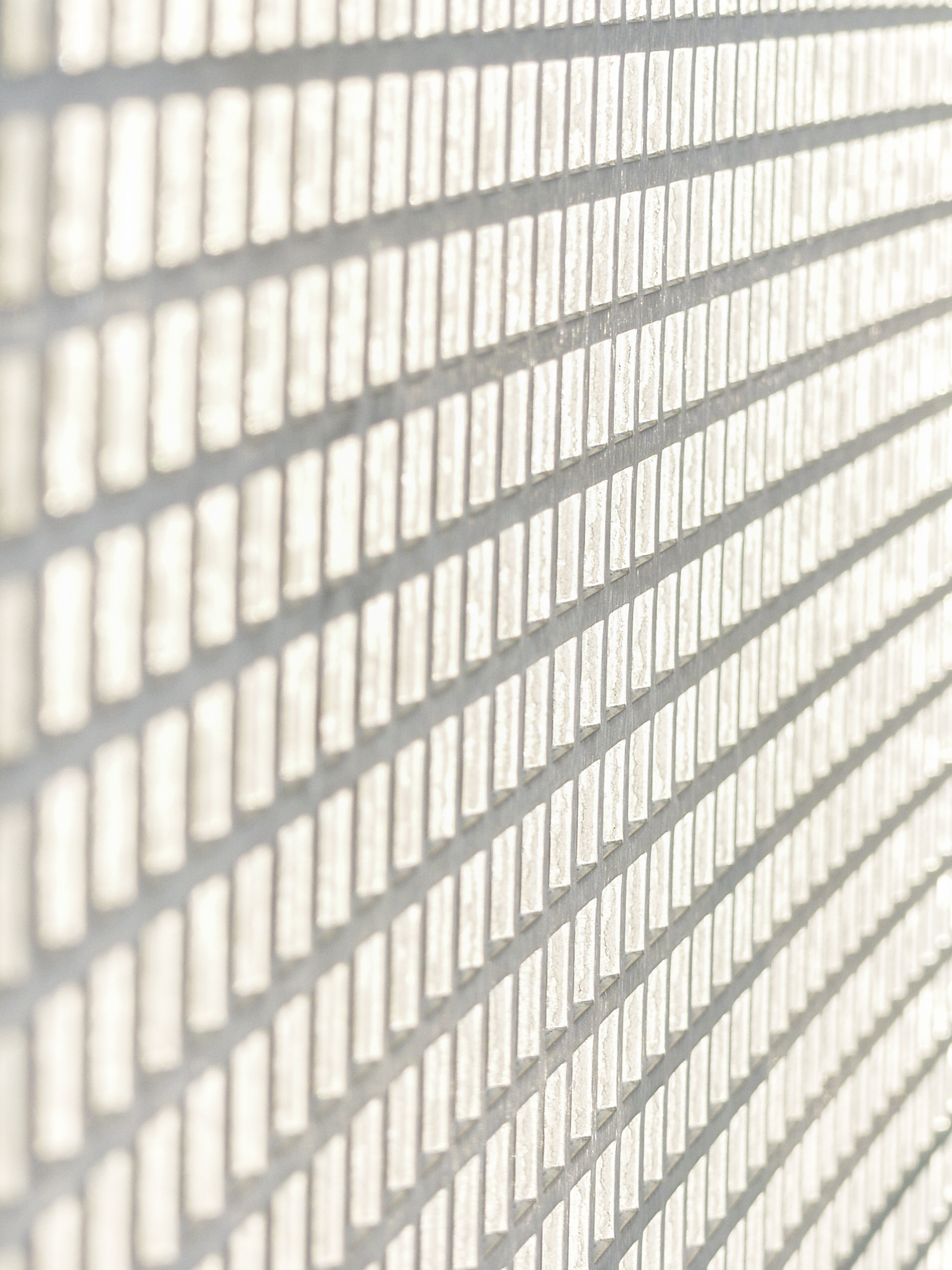 Detail of the aluminum metalwork at the Baron BMW Showroom