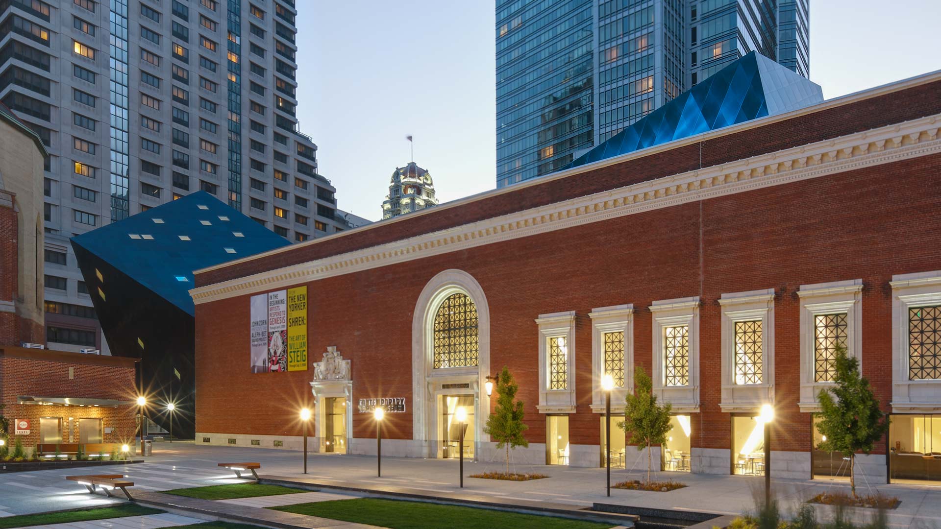 Evening photograph of the Studio Daniel Libeskind-designed Contemporary Jewish Museum .