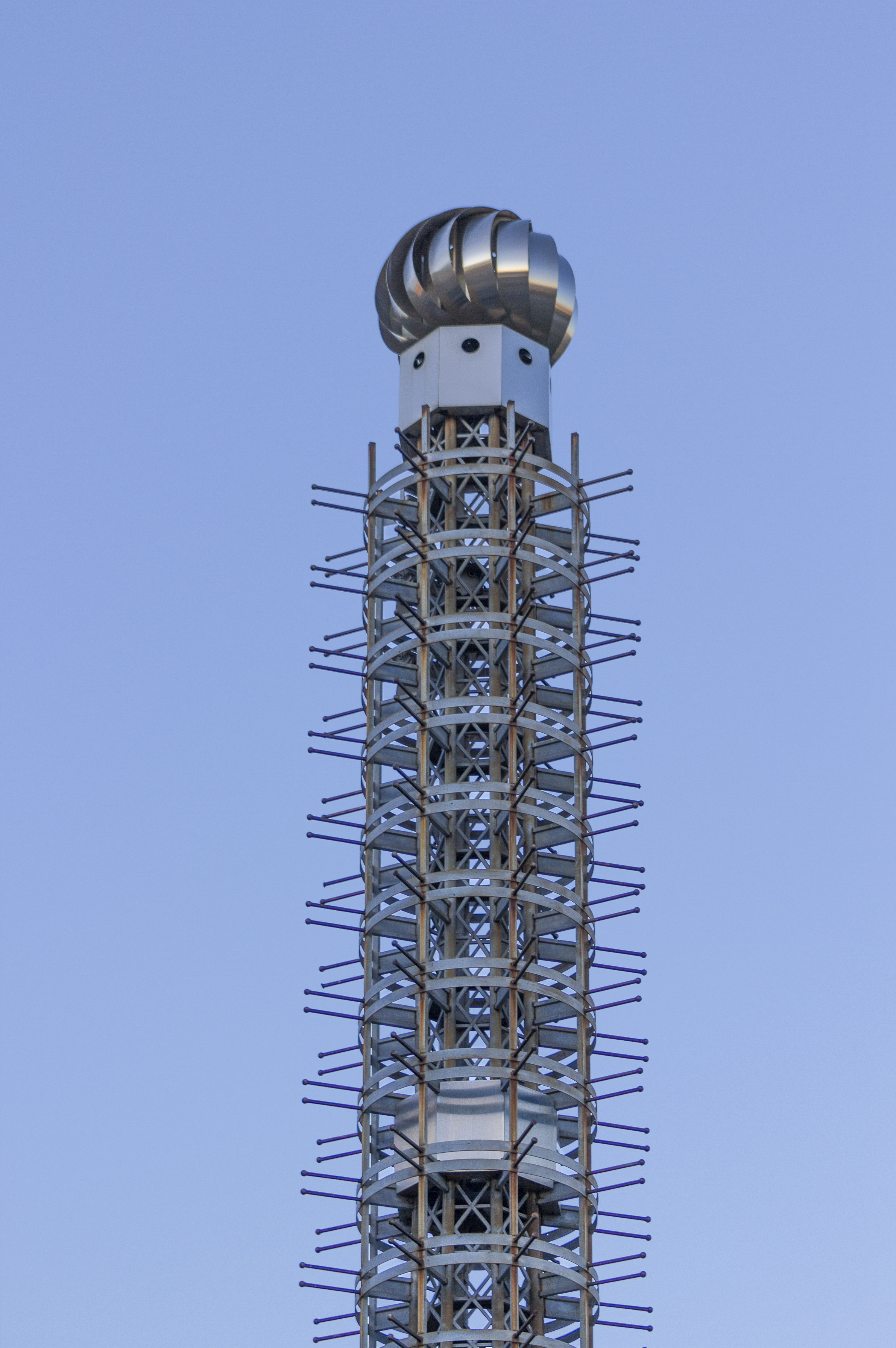 Spinning roof turbine vent tops the Sport Stacks artwork by R.M. Fischer