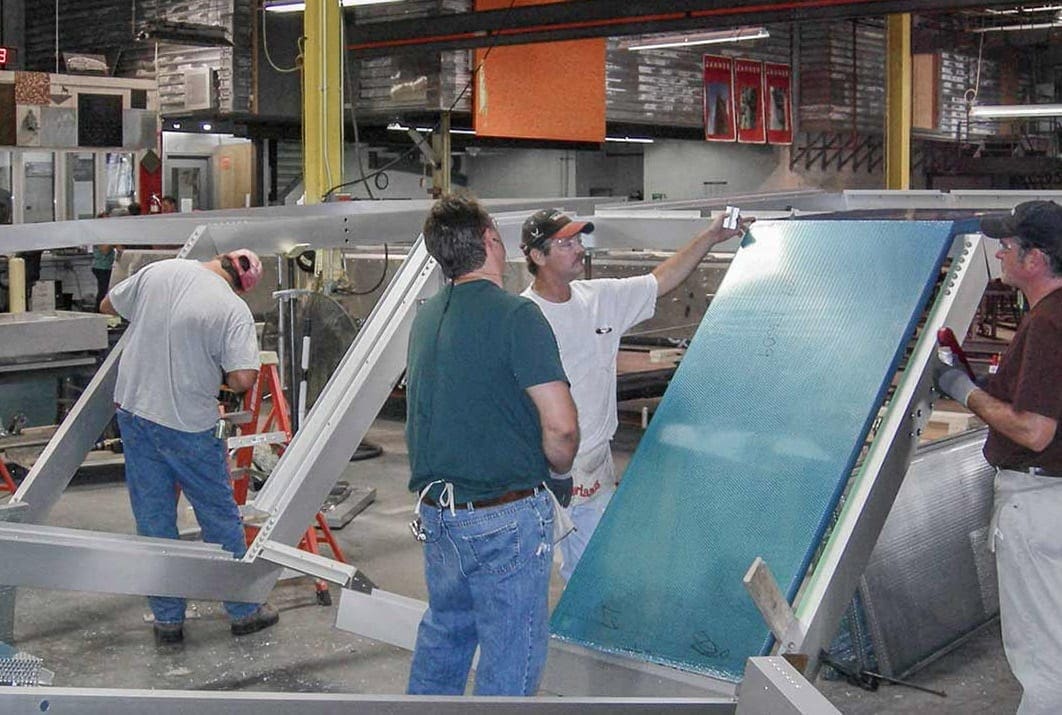 Fabricators at Zahner assemble the Cooper Union facade in Kansas City.