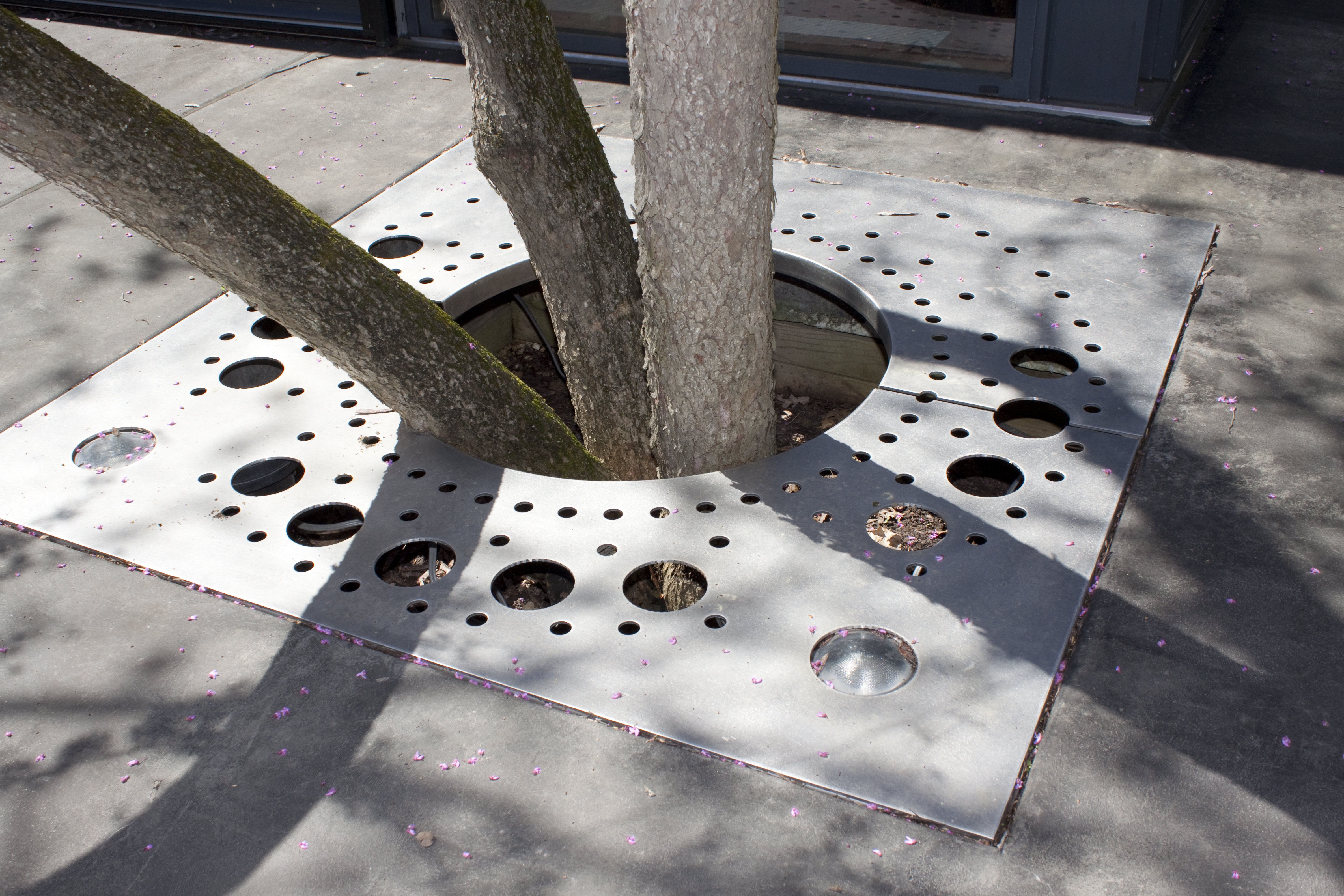 Custom tree gate planter for the tree surrounds at Gaines Residence