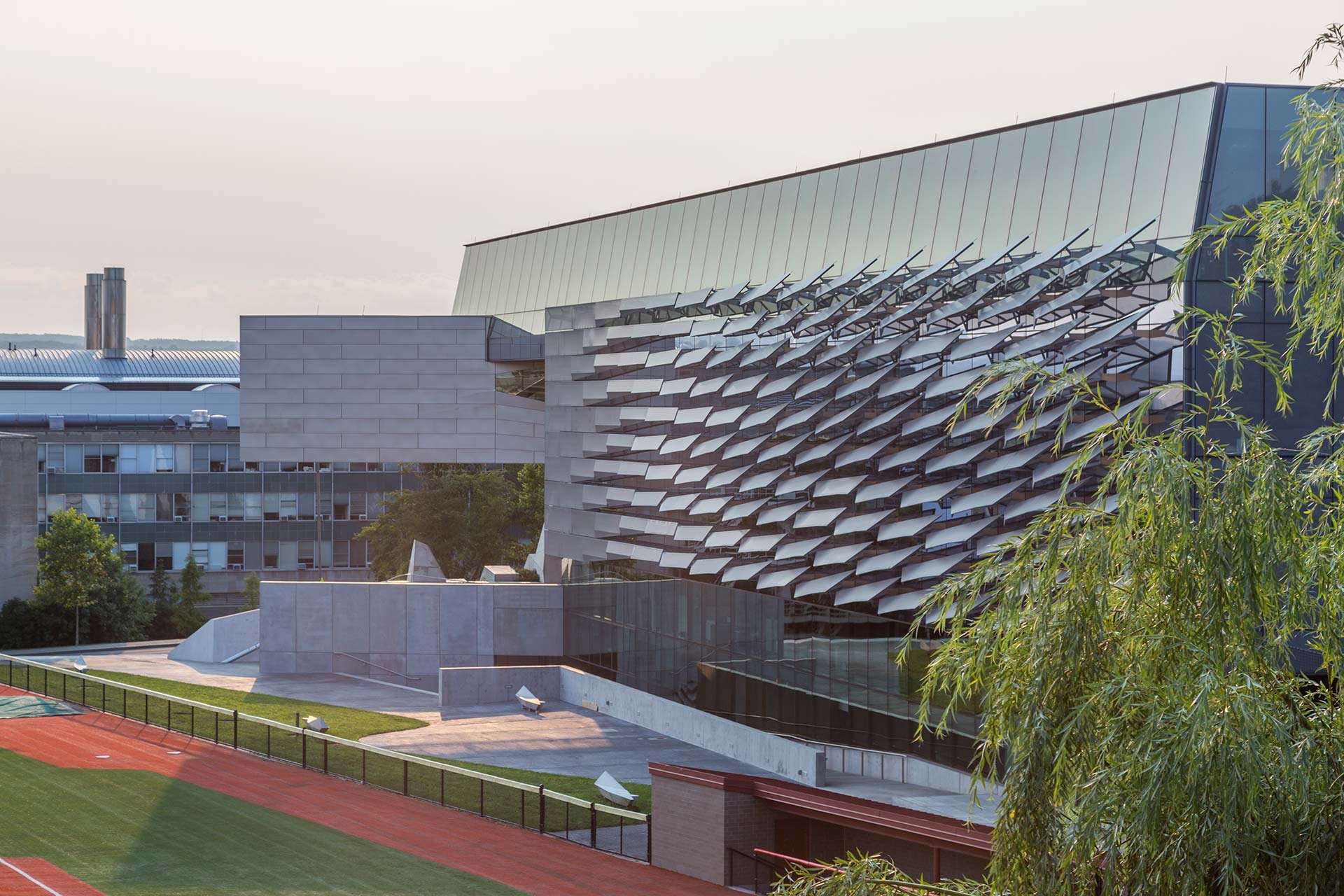 Gates Hall facade seen from the adjacent baseball field parking structure.
