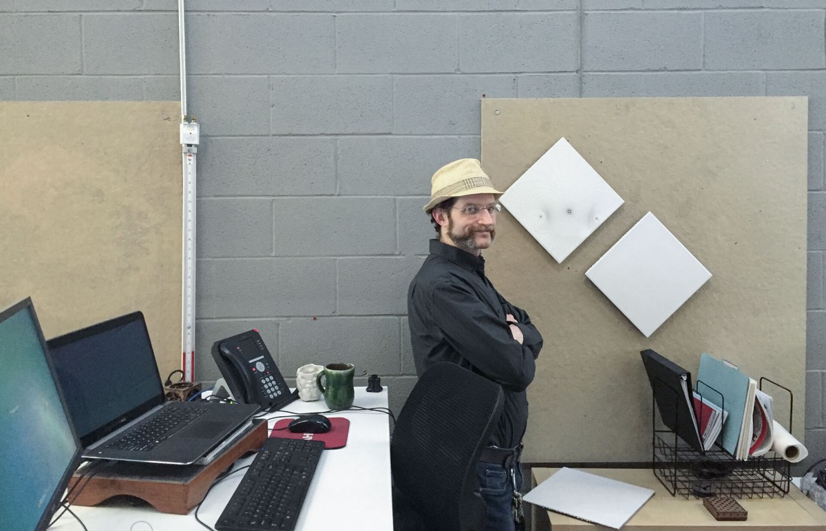 Jo Kamm at his workstation in the Zahner engineering facility.