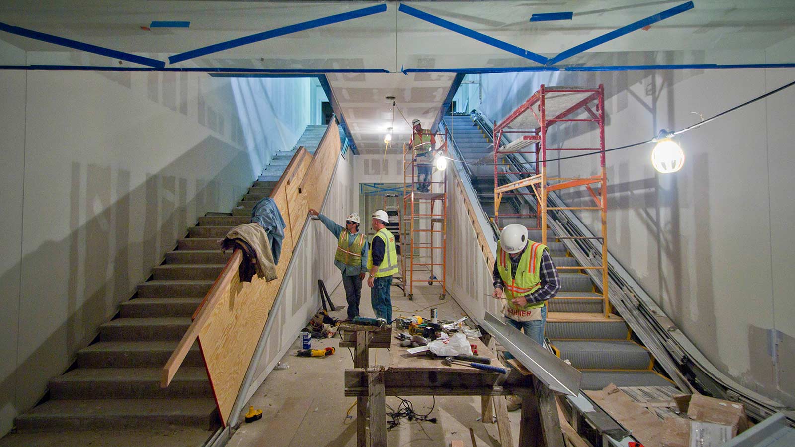 Installation of Kauffman Center interior metalwork by Zahner field operators.