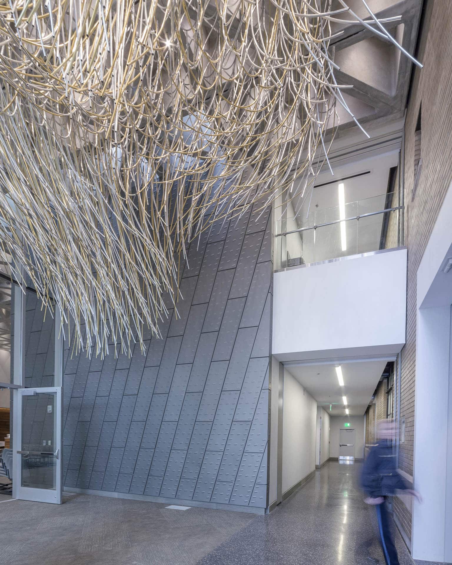 Interior space with custom zinc featurewall at KCPD Headquarters.
