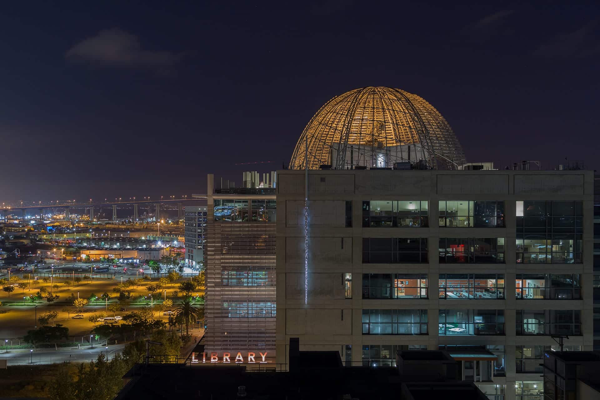 The San Diego Central Public Library at night.