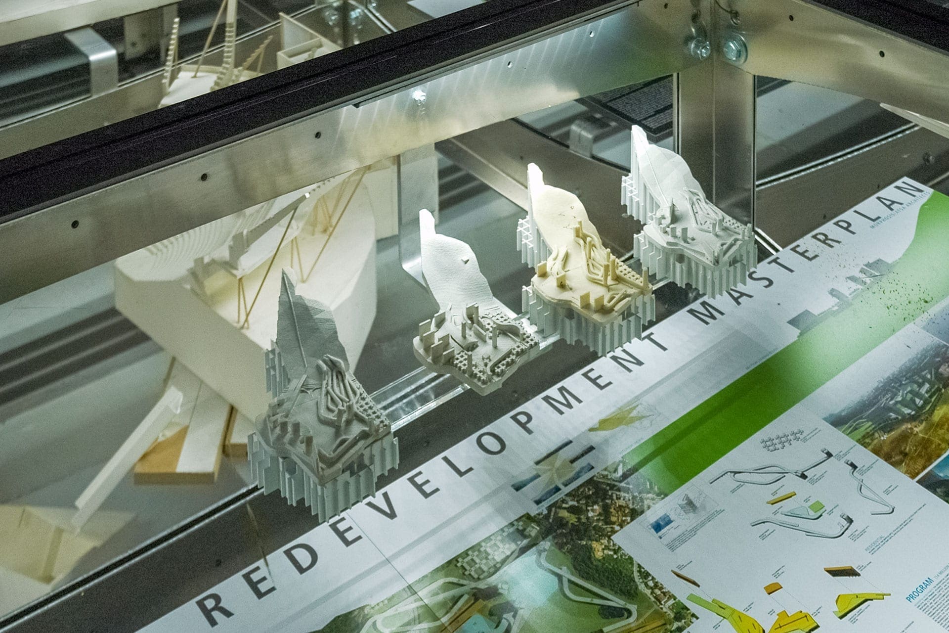 Various exhibit materials displayed underneath the raised floor.