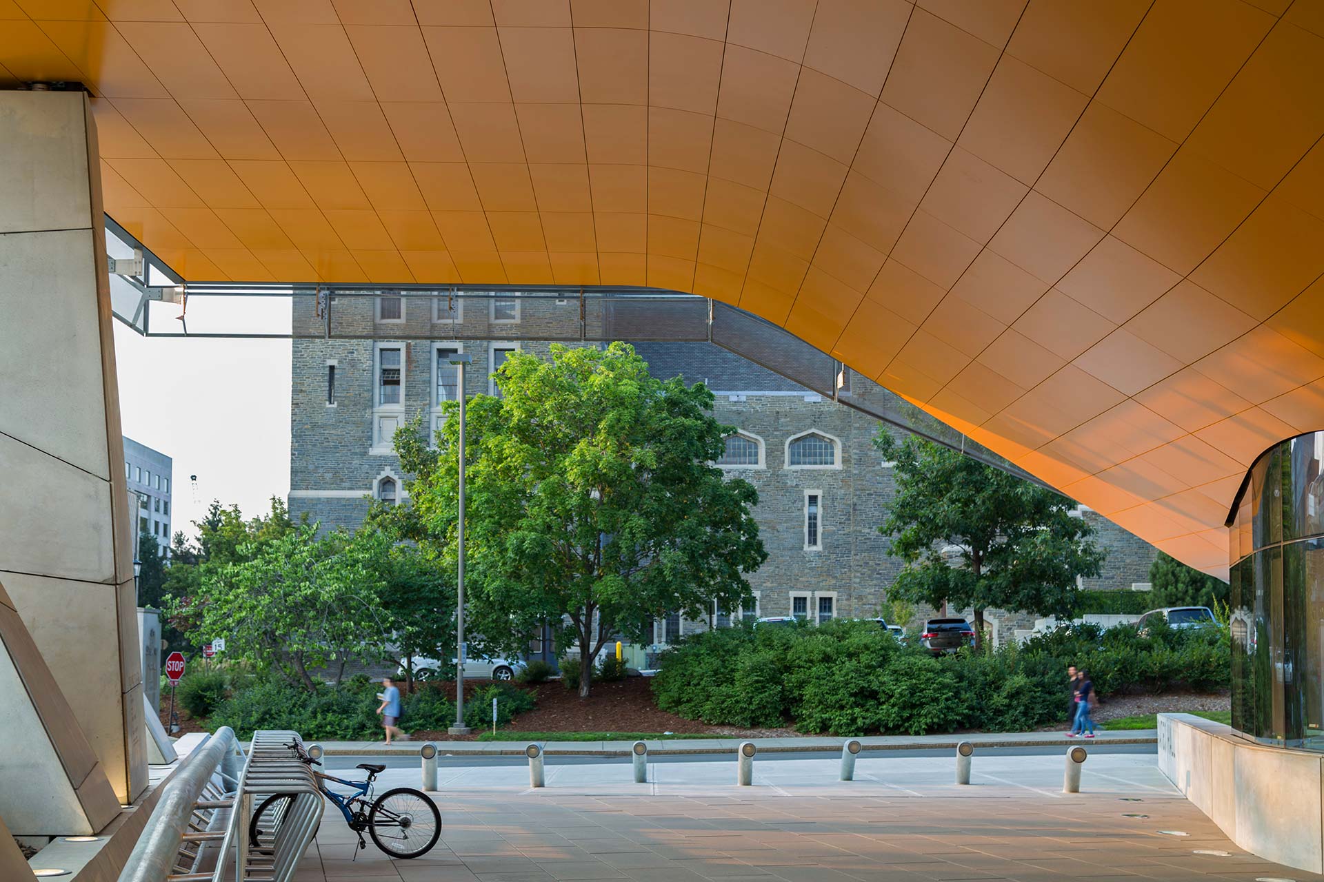 Photograph of orange-coated aluminum soffit panel system at Gates Hall.