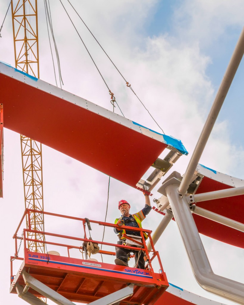 Zahner installers align the massive ZEPPS panel assemblies onto the structural “trees” at the Petersen Museum.