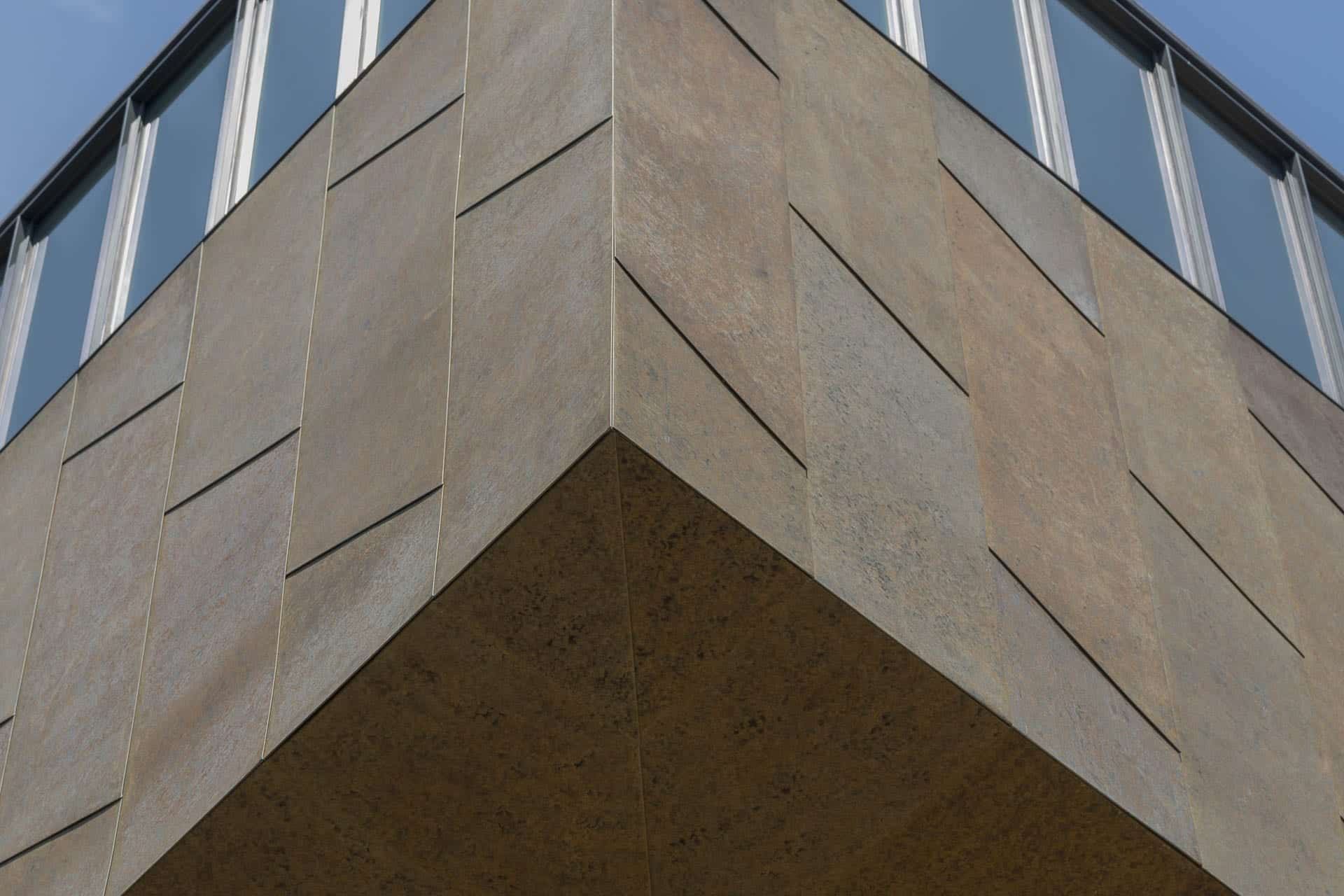 Detail of the custom zinc ceiling corner and facade for the McMurtry Building in Stanford, California.