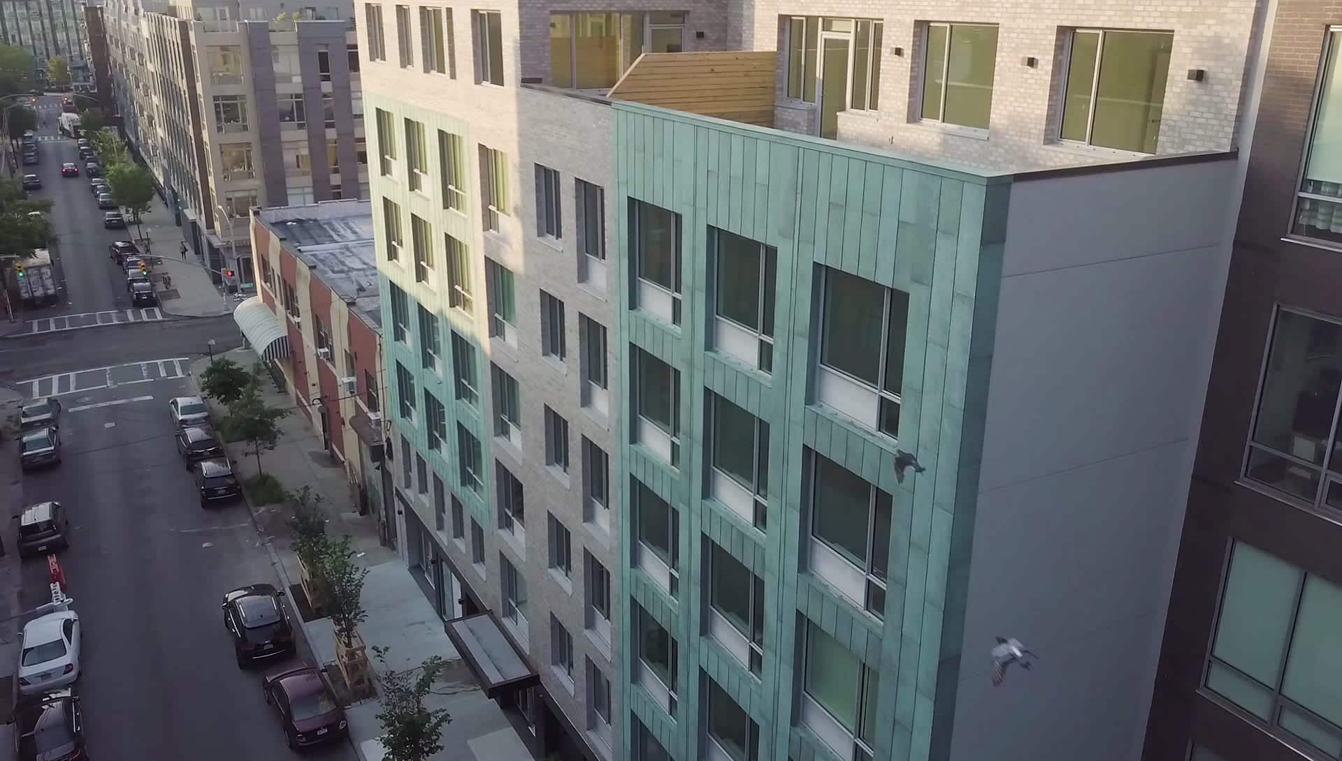 Facade for 178 North Eleventh with antique copper patina in Brooklyn, New York.