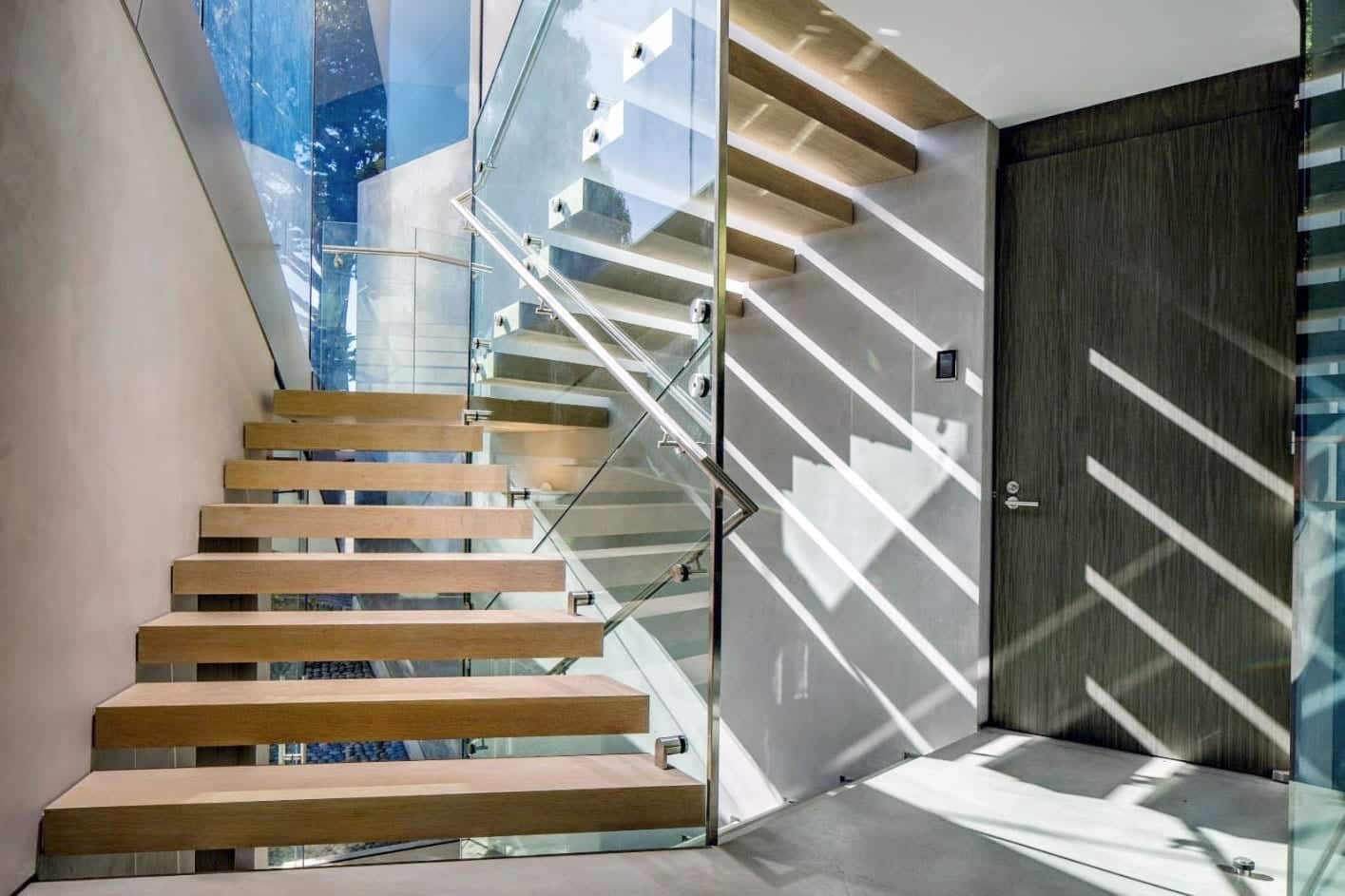 Interior stainless steel accents frame the spaces of the Serenity residence.