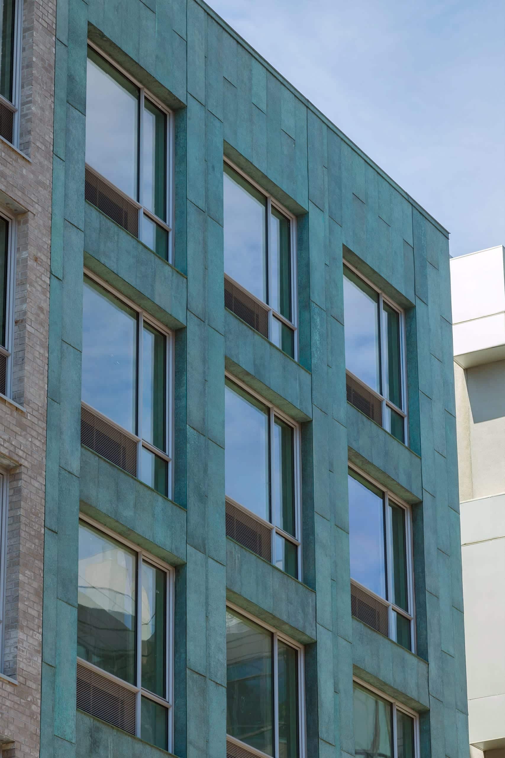 Facade for 178 North Eleventh with antique copper patina in Brooklyn, New York.