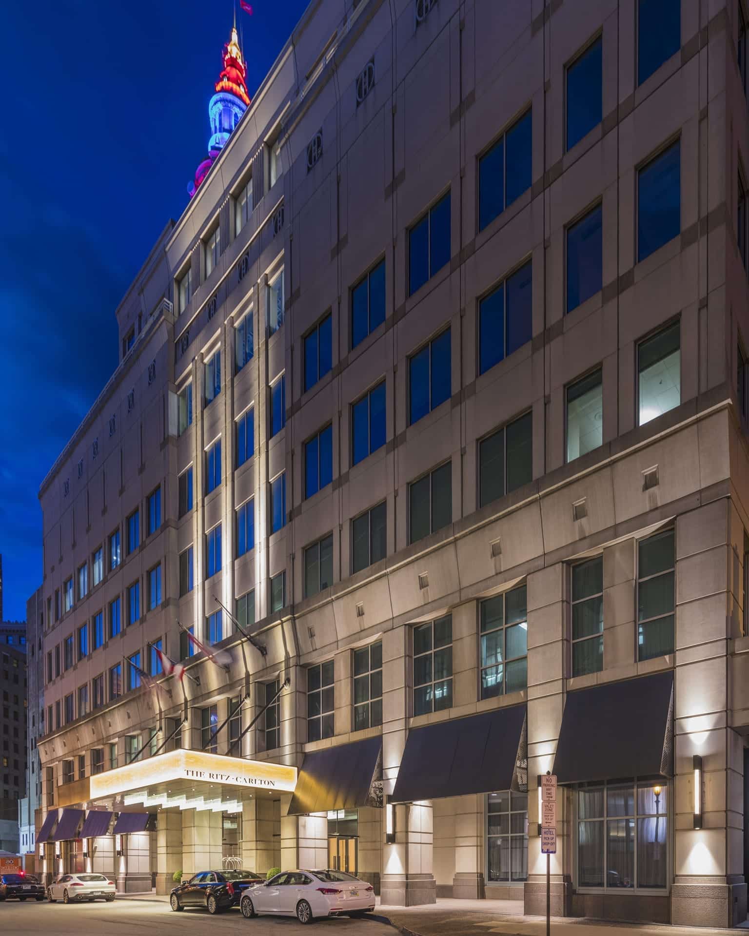 Anodized aluminum panels and structure for a series of awnings. Raised circles on the front create a pattern while still protecting from the elements.