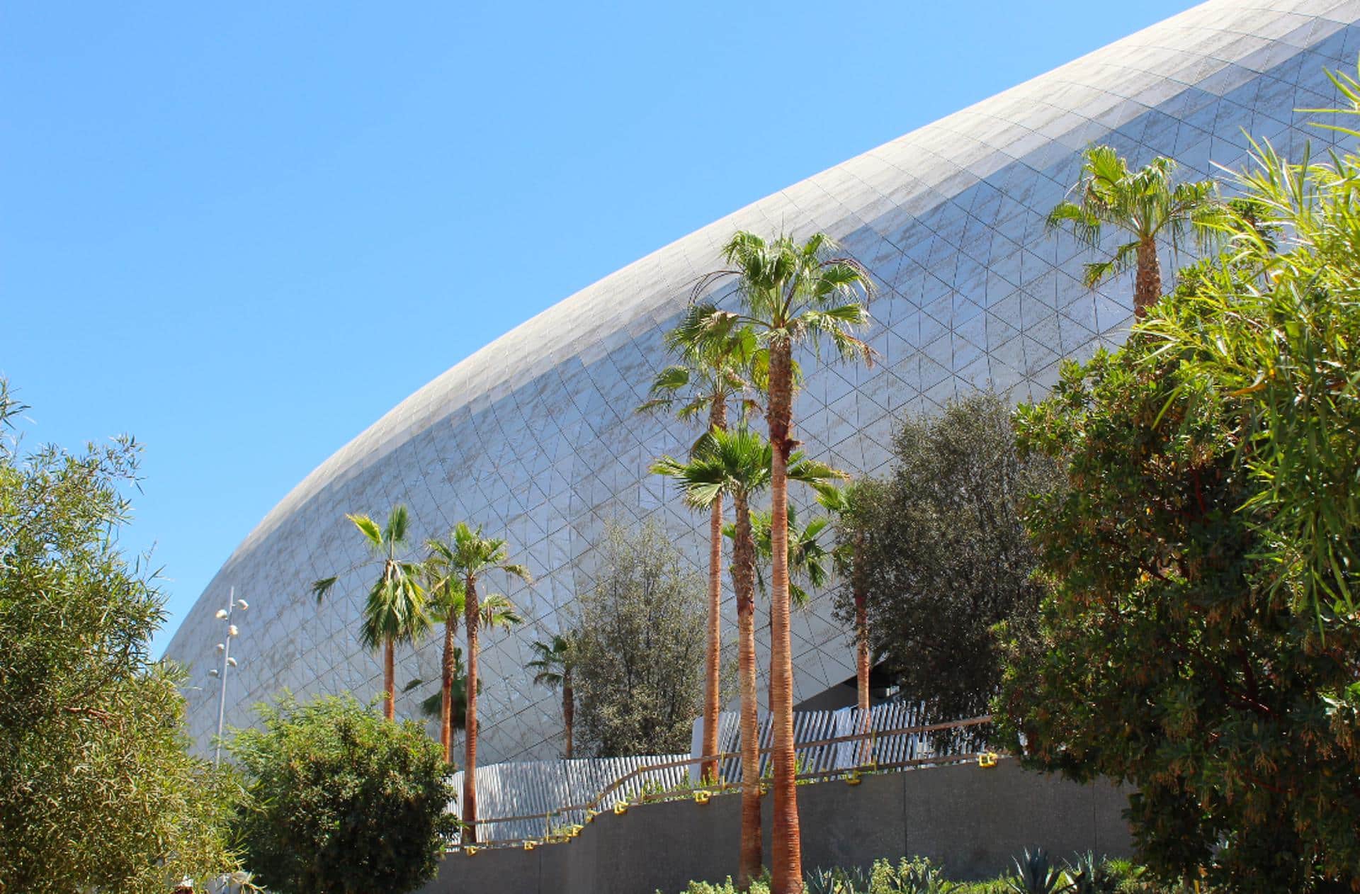 A daylight view of the perforated aluminum panel canopy and skin for SoFi Stadium.