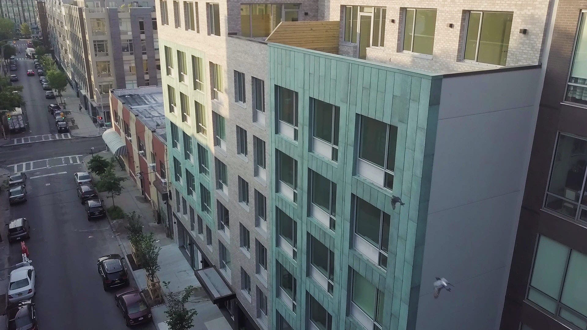 FACADE FOR 178 NORTH ELEVENTH WITH ANTIQUE COPPER PATINA IN BROOKLYN, NEW YORK.