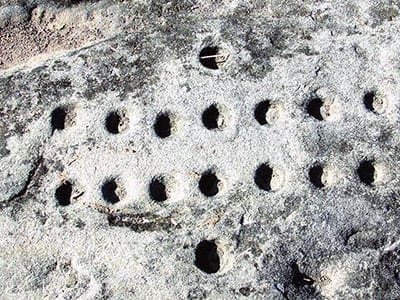 Islamabad cupules, Pakistan, 290,000-700,000 BCE.